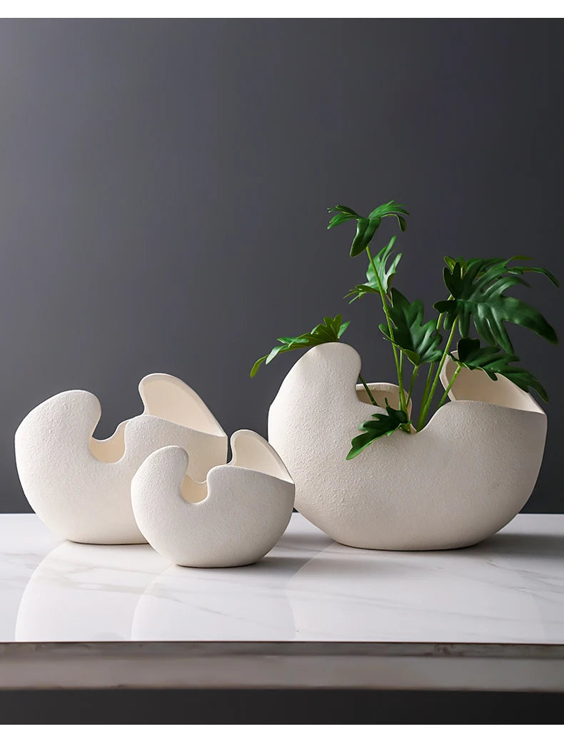 Modern ceramic egg shaped white tabletop vase