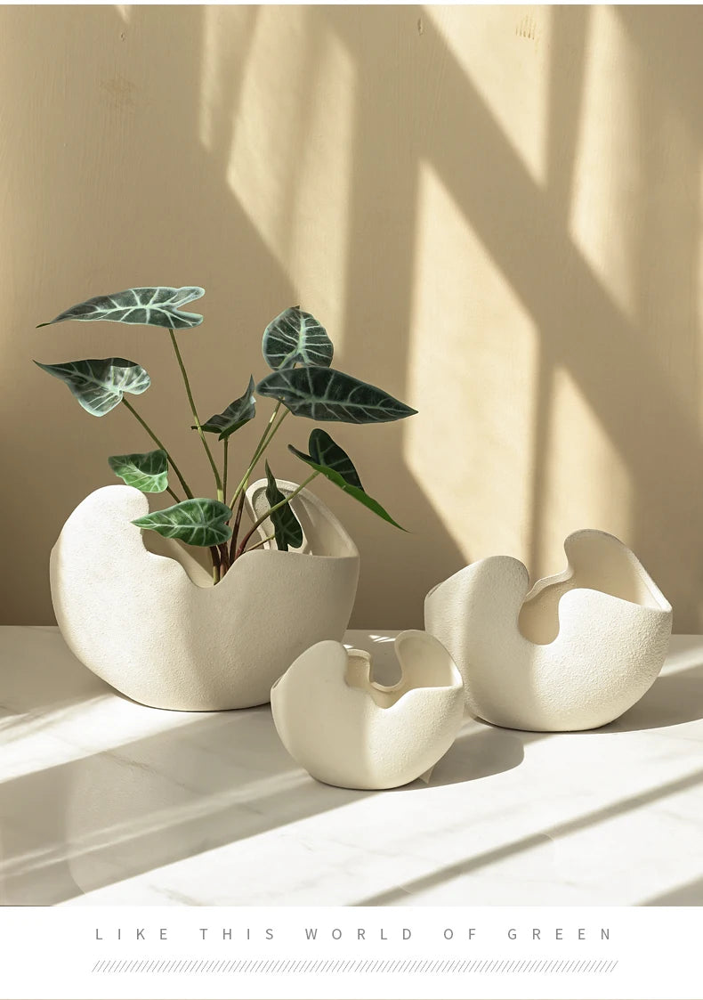 Modern ceramic egg shaped white tabletop vase